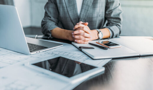 https://www.ablion.com/storage/2021/09/crello-210678396-stock-photo-cropped-image-businesswoman-sitting-table-scaled-1-519x305.jpeg